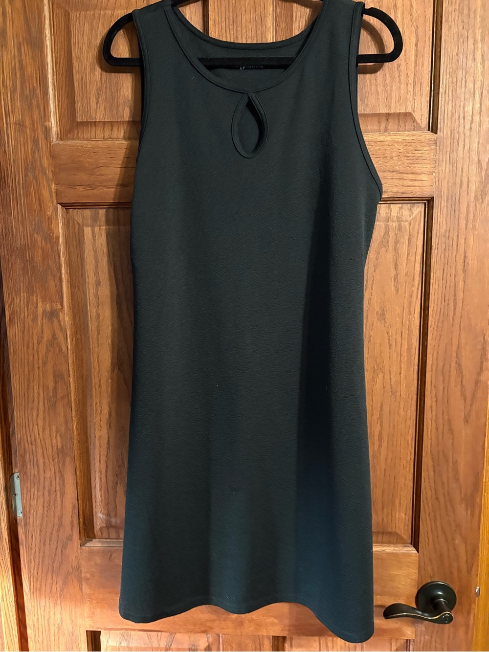 Classic Black Sleeveless Shift Dress with Keyhole Neck